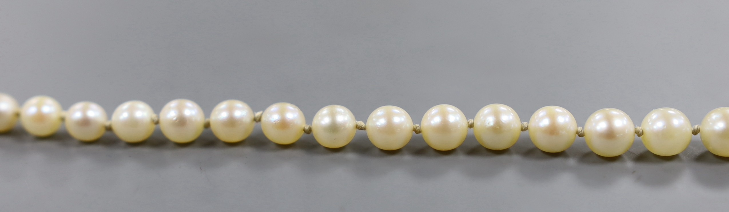 A singe strand graduated cultured pearl necklace, with 9ct clasp, 56cm (a.f.).